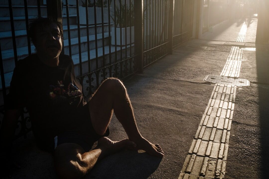 Brazilian woman reflecting calmly by a window