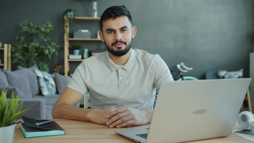 man practicing speech at home