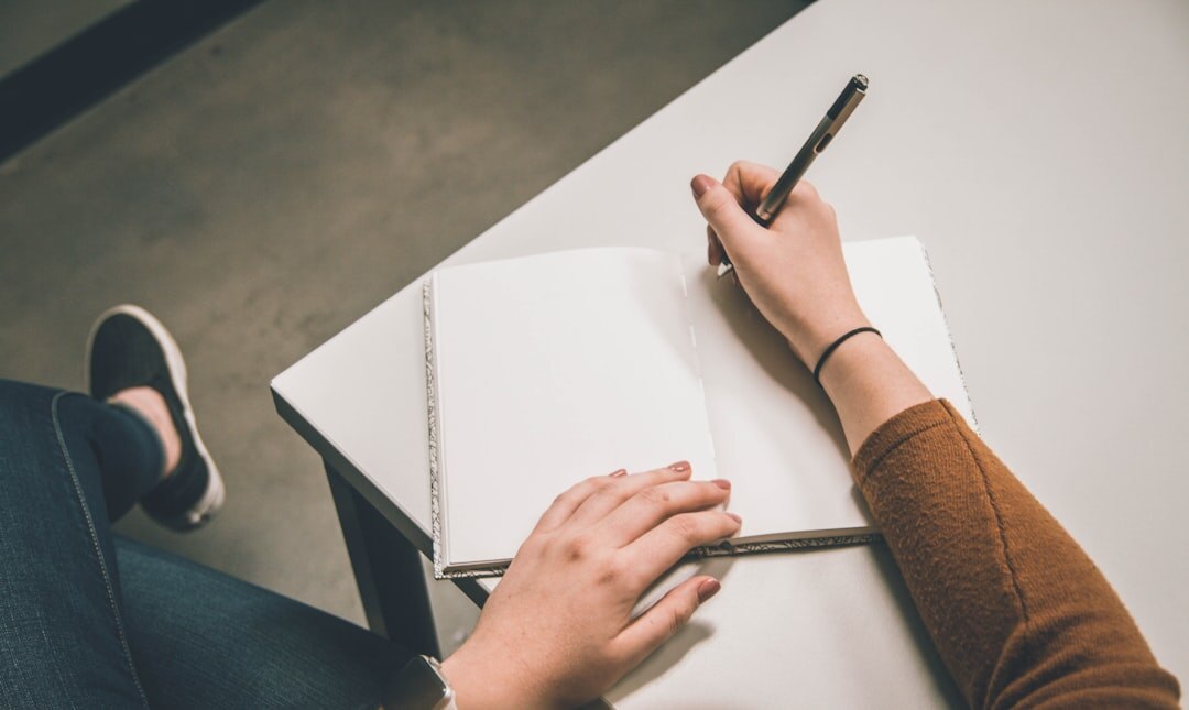 person journaling thoughts