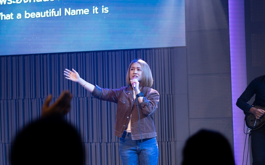 woman presenting to audience
